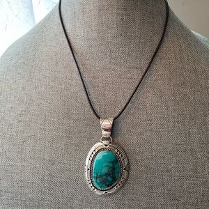 Signed J Nelson Turquoise and Silver pendant
